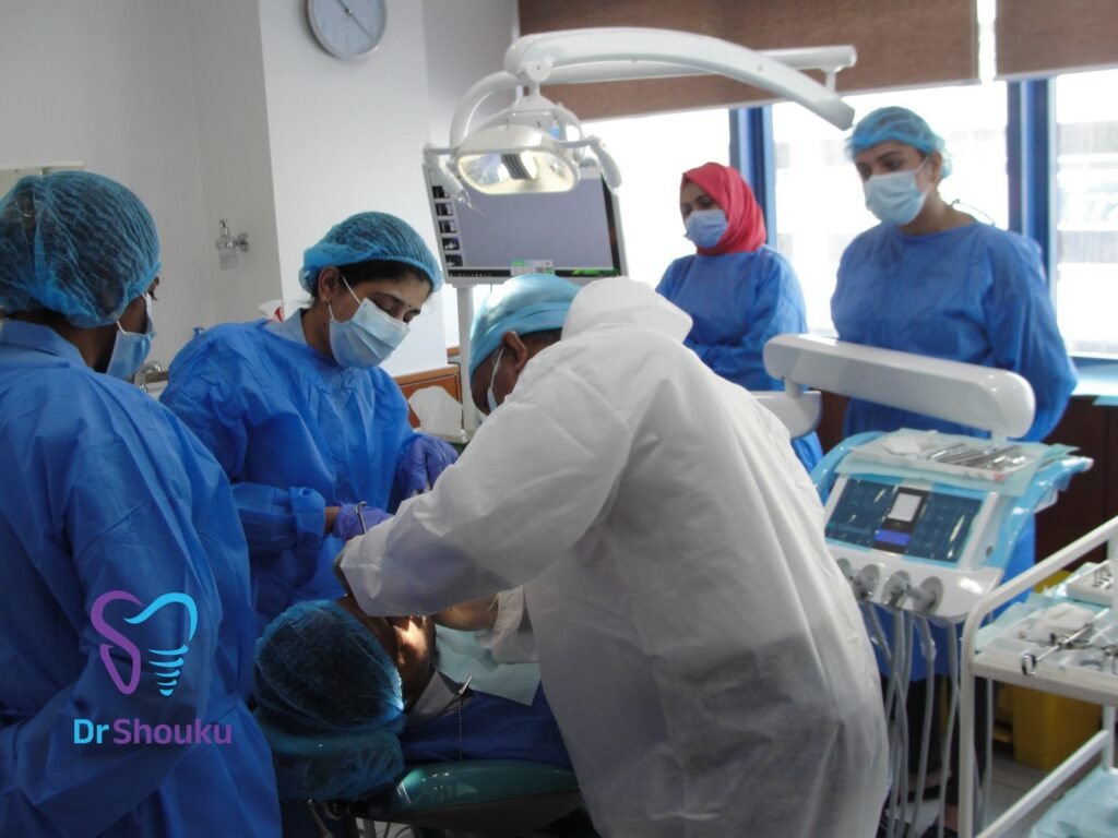 Dental team treating a patient at Dr. Shouku Dental Clinic